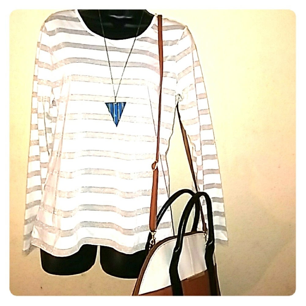 New just in time for spring cute long blouse